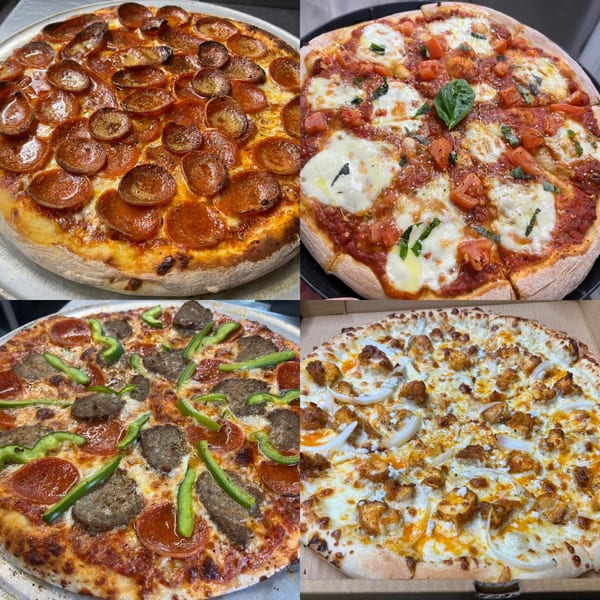 Four Pizzeria 131 pizzas: pepperoni, Margherita, sausage and peppers, and buffalo chicken.